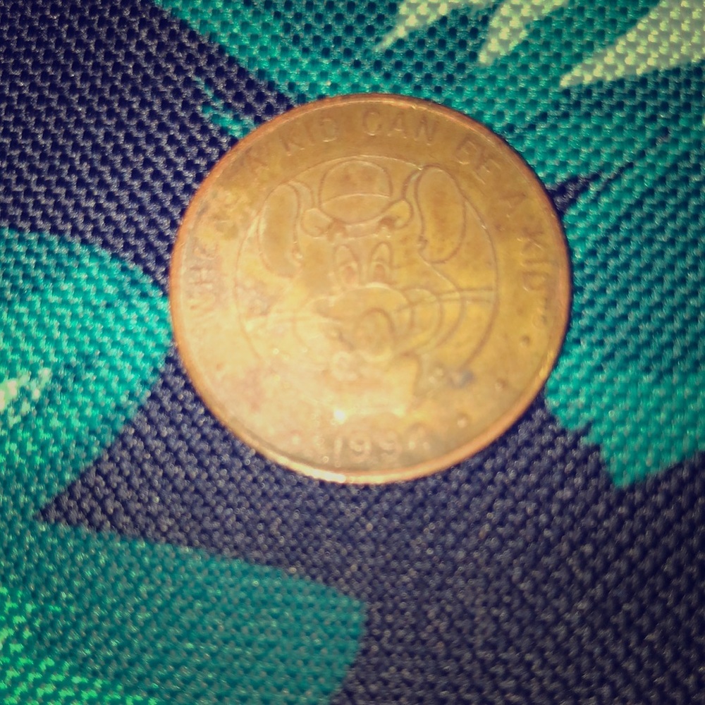 Original Chuck E. Cheese 1994 coin.